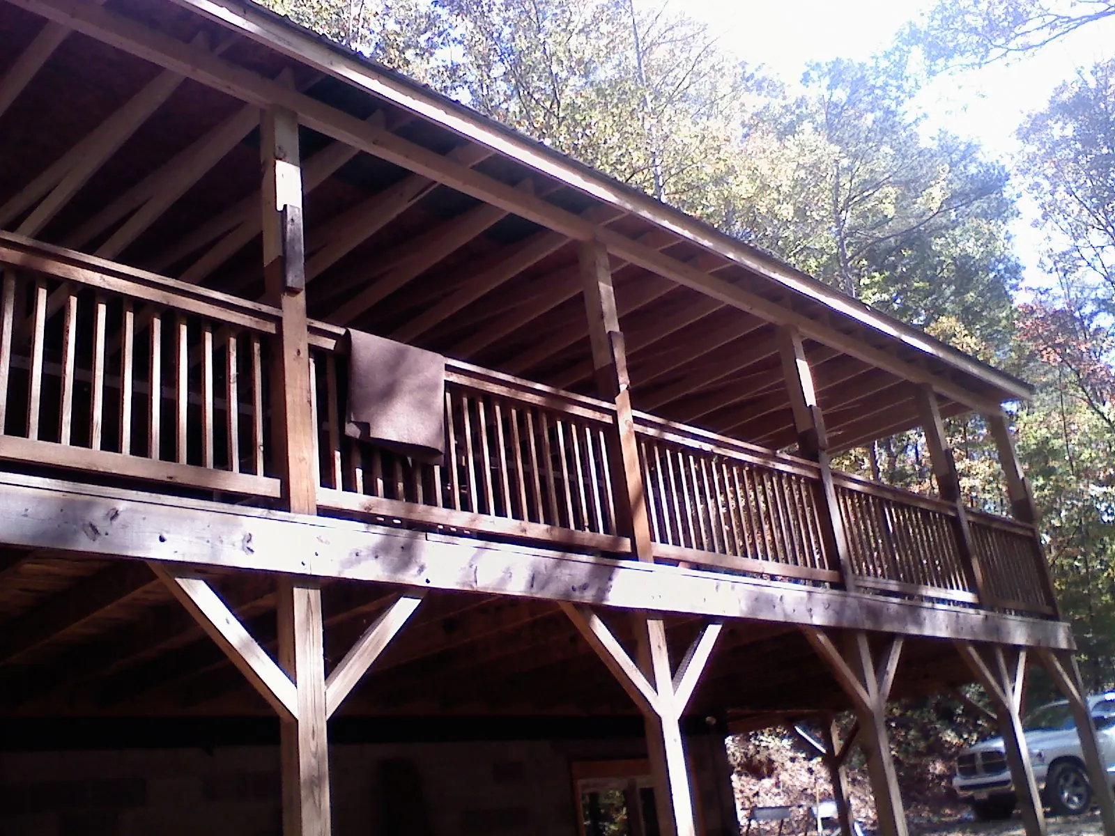 Timber framing under a new elevated porch and deck — Roof Leak Repair in Davey by Roofing Brothers